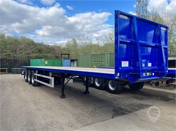 2023 MONTRACON BRAND NEW 13.6  TRI AXLE FLATBED Used Standard Flatbed Trailers for sale