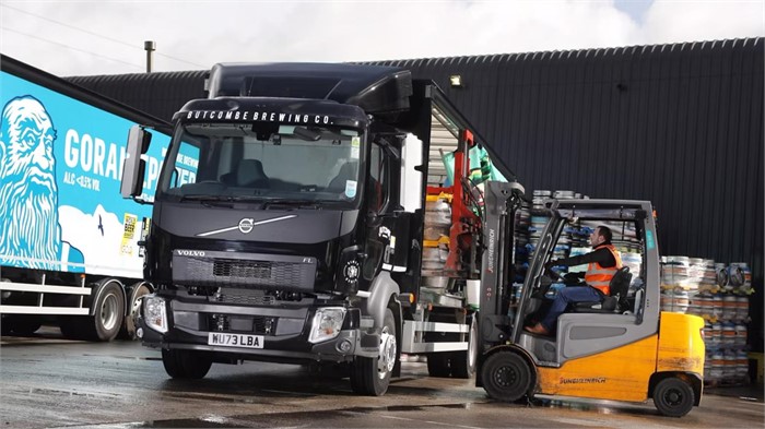 A Butcombe Brewery employee loads the firm’s new Volvo FL rigid curtainsider with a forklift.
