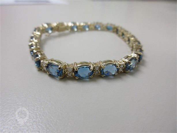14K YELLOW GOLD BLUE TOPAZ AND DIAMOND BRACELET New Bracelets Fine Jewellery auction results