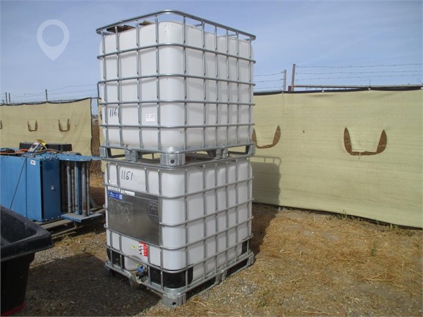 (2) POLY TANKS W/CAGES Used Storage Bins - Liquid/Dry auction results