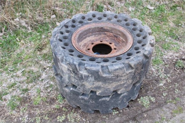 (2) SKIDSTEER TIRES AND RIMS, SELLS AS ONE MONEY Used Other auction results