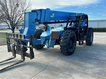 Duron Equipment Inc. - Got something high up needing some TLC? Look no  further than the Genie GTH 1056 with the Haugen Work Platform! 10,000 LBS  lift capacity and 56ft of reach.