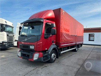 2014 VOLVO FL210 Used Curtain Side Trucks for sale