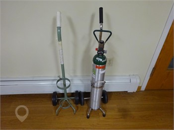 AIRGAS OXYGEN BOTTLE AND CART Used Medical Supplies / Lab Equipment auction results
