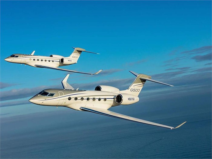 Gulfstream G500 (foreground) and G600 (background) business jets fly in formation.