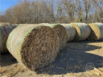 What is a normal hay bale size, and how many can I get per acre