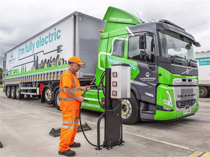 A LondonEnergy driver recharges his Volvo FM Electric truck.