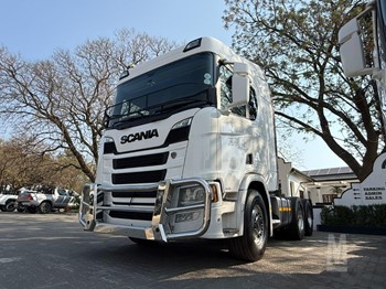A 2022 Scania R460 tractor unit parked.