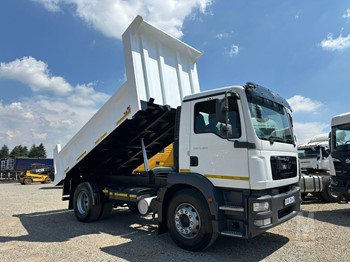 A 2020 MAN TGM 18.240 tipper truck with its tipper body extended.