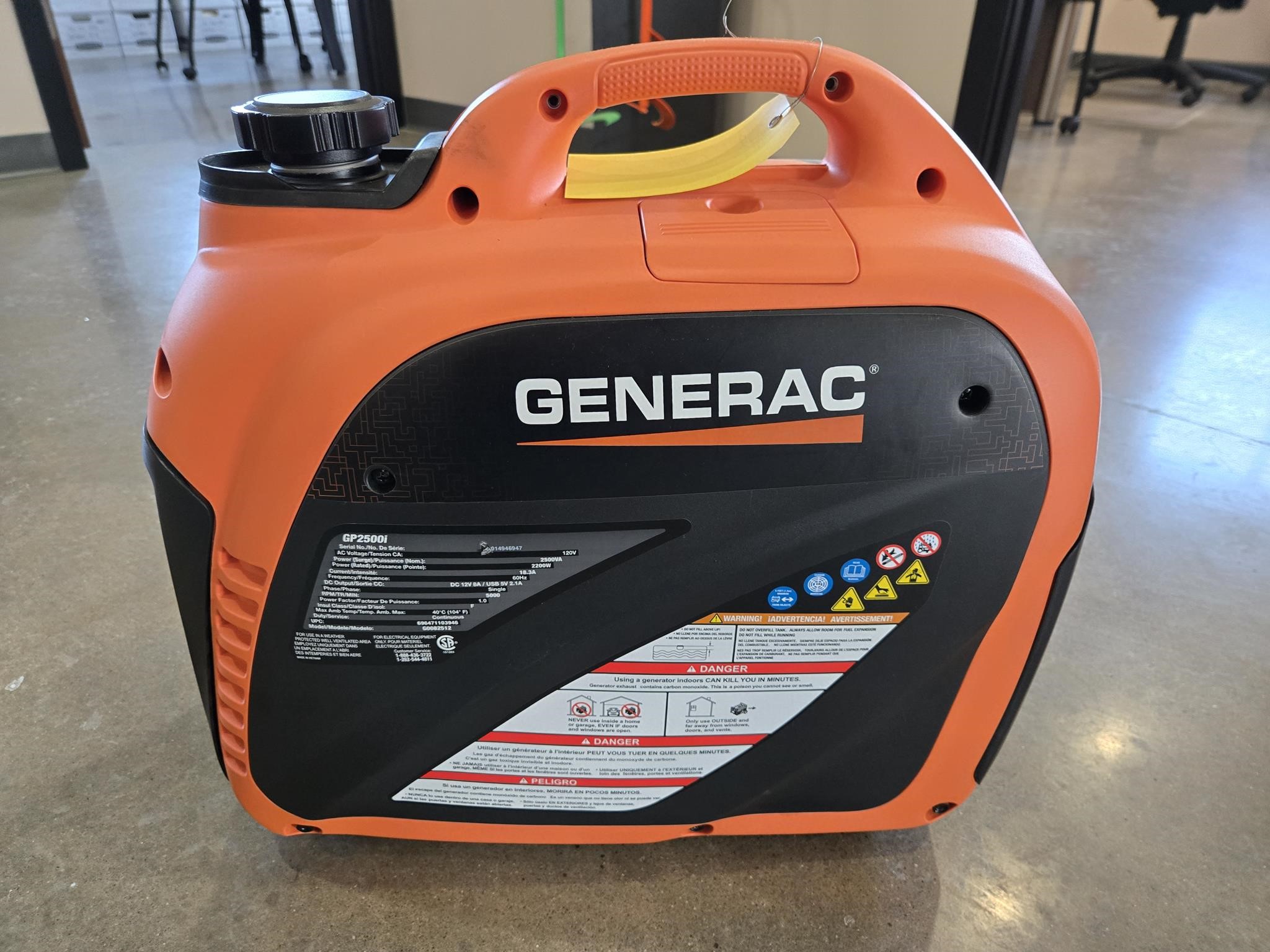 2025 Generac GP2500I compact recreational generator displayed indoors on the floor.