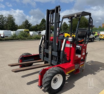A 2021 Moffett M5 25.3 truck-mounted forklift parked on a lot.