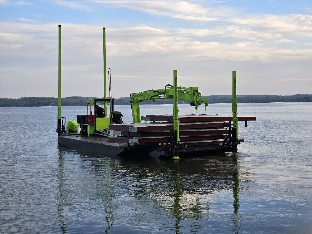A 2026 RTR MFG 36-120 harbor, marine, and barge crane on water.