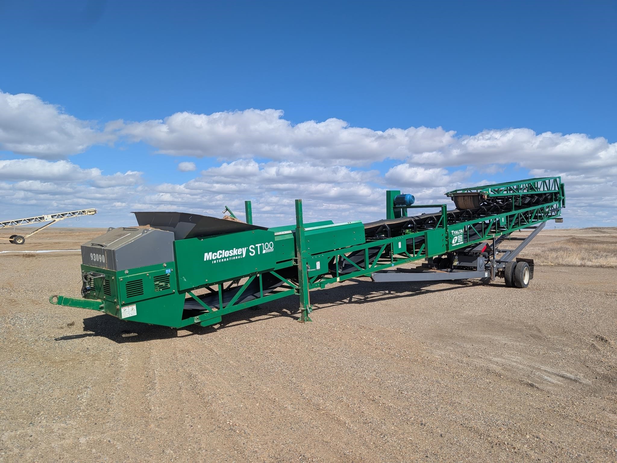 A 2023 McCloskey ST100E stacker.