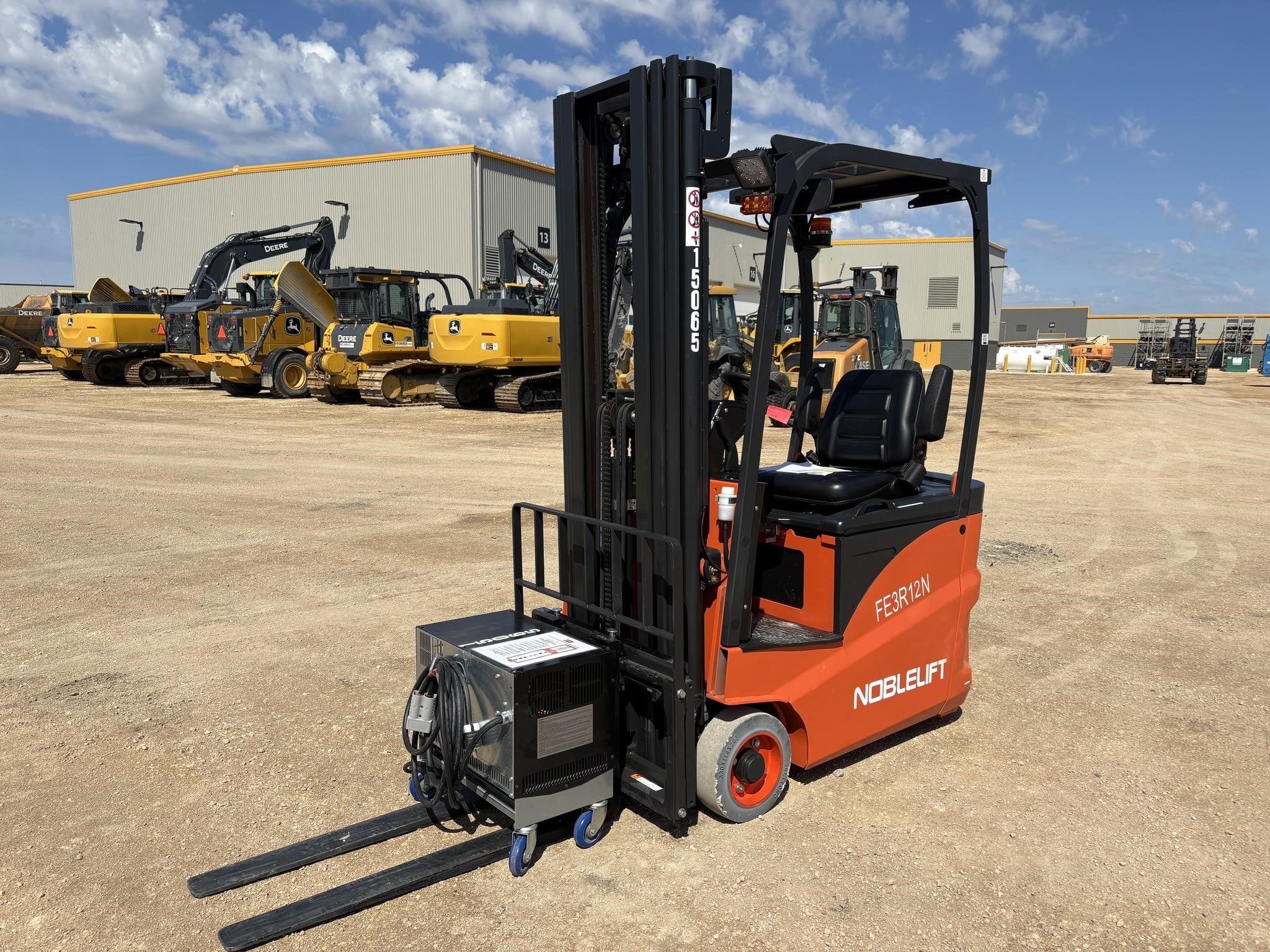2022 NOBLELIFT FE3R25N cushion-tire forklift parked on gravel outdoors.