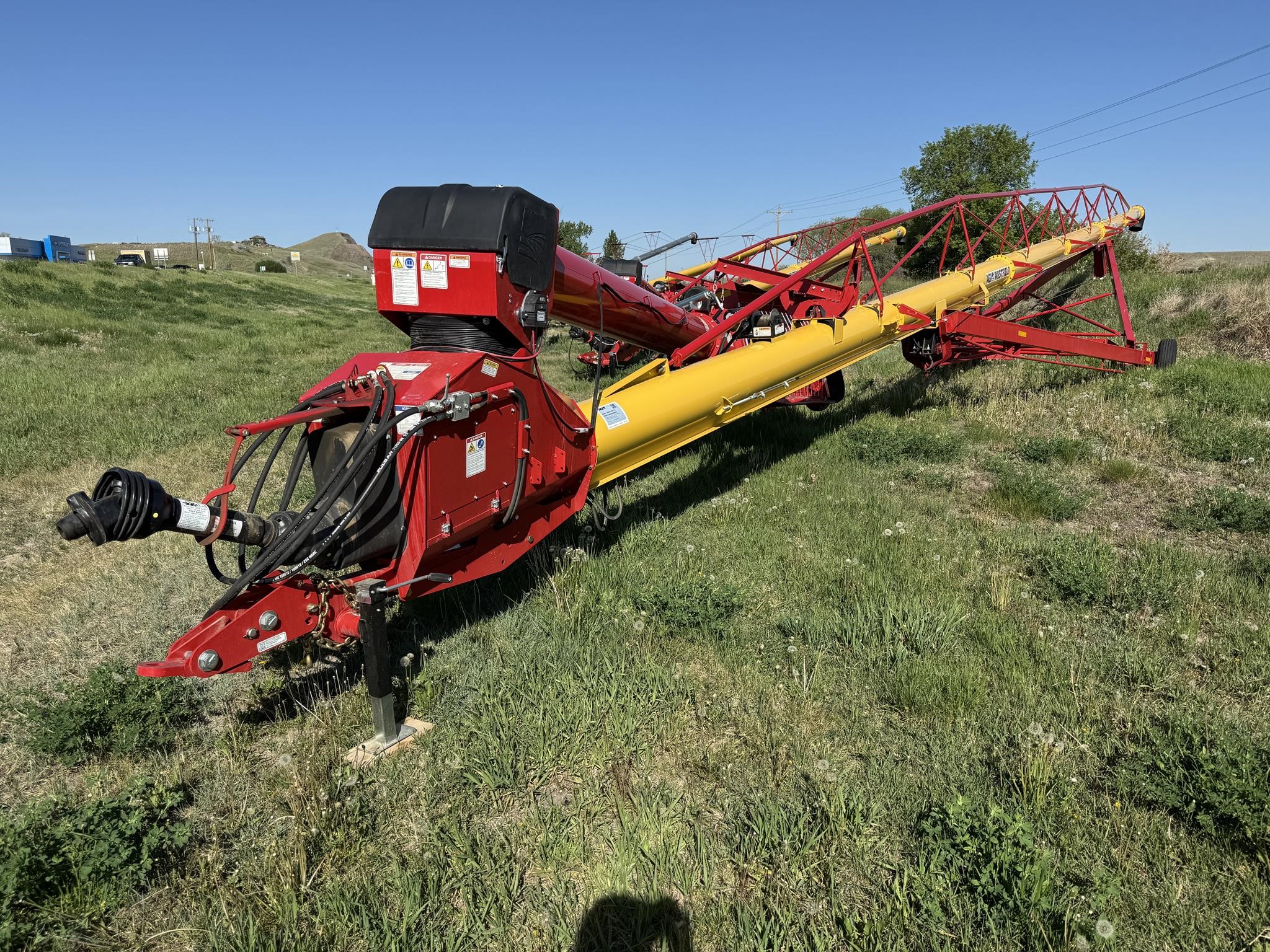 A 2026 Westfield MKX2 13-94 grain auger in a field.
