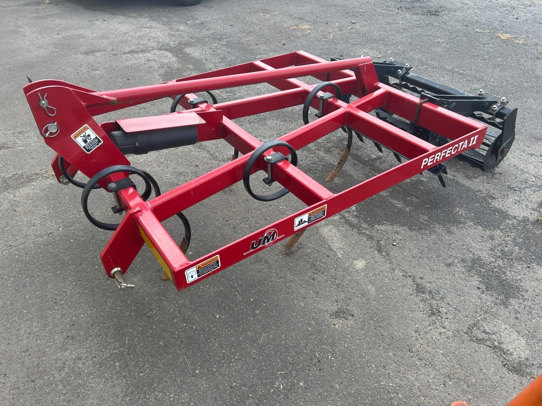 2023 Unverferth Perfecta II field cultivator parked outdoors.