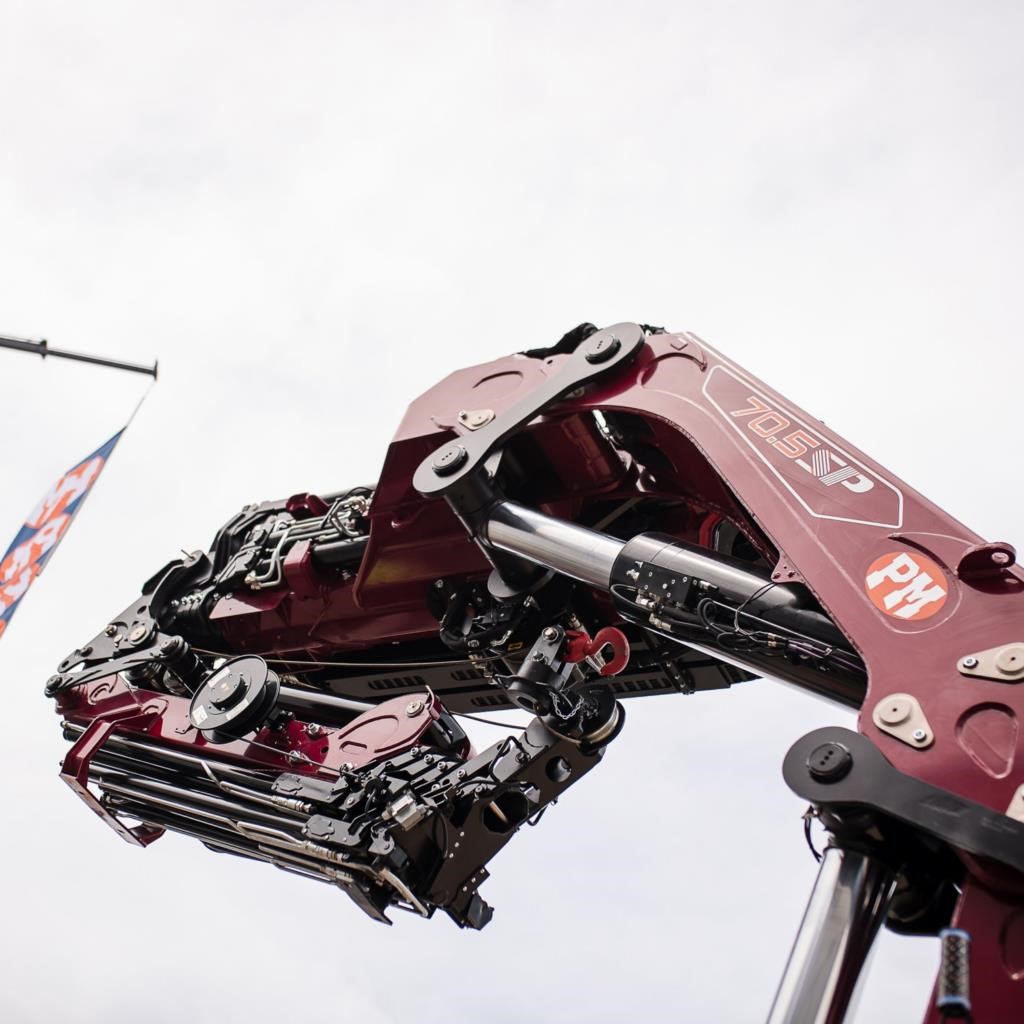 2025 PM 70.5 SP unmounted knuckle boom crane in the sky.