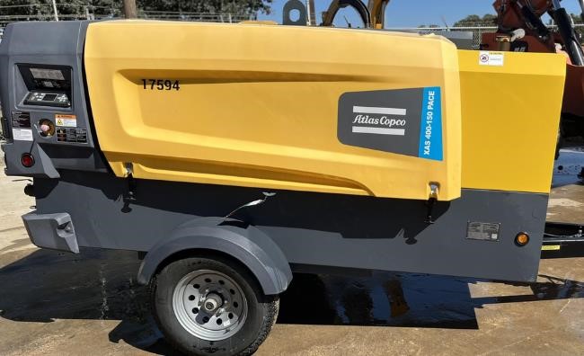 A 2022 Atlas Copco 400 CFM Air Compressor sits on a lot.