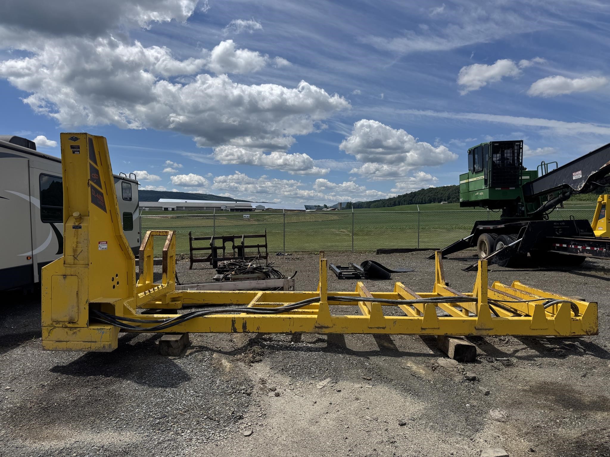 2025 CSI DL4400 slasher saw parked outdoors.