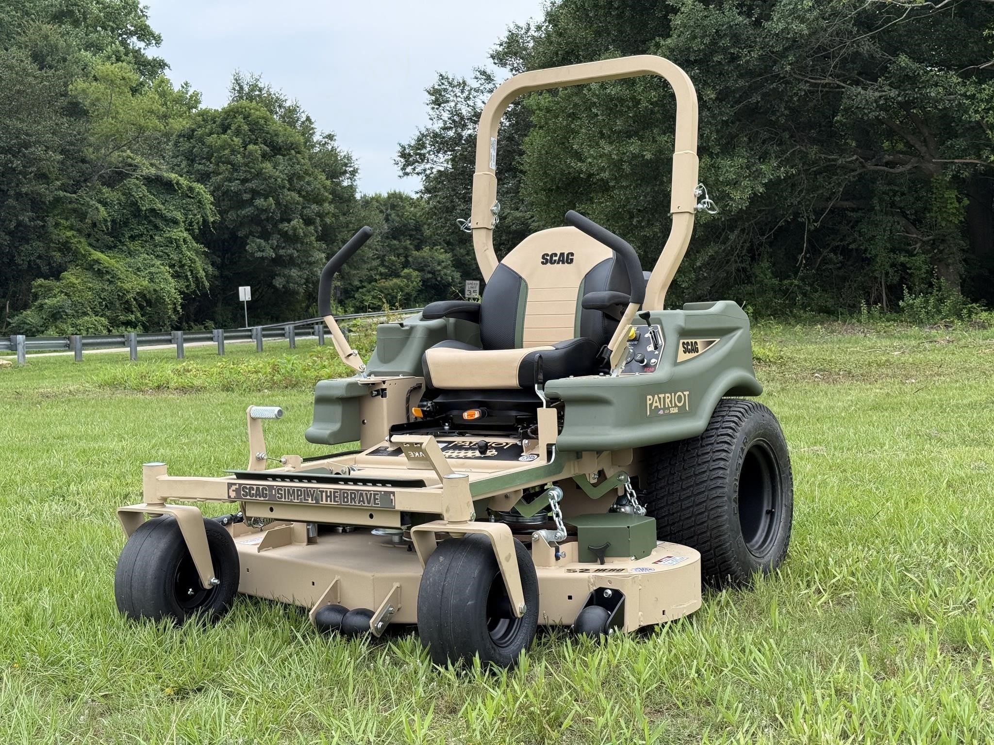 2026 Scag SPZ52H-22FX zero turn lawn mower parked outdoors.