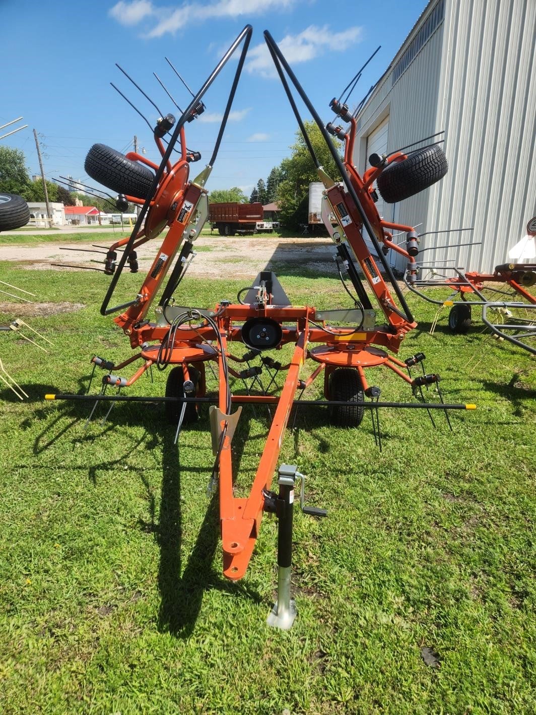 2026 Pequea HT4102 tedder parked on grass outdoors.