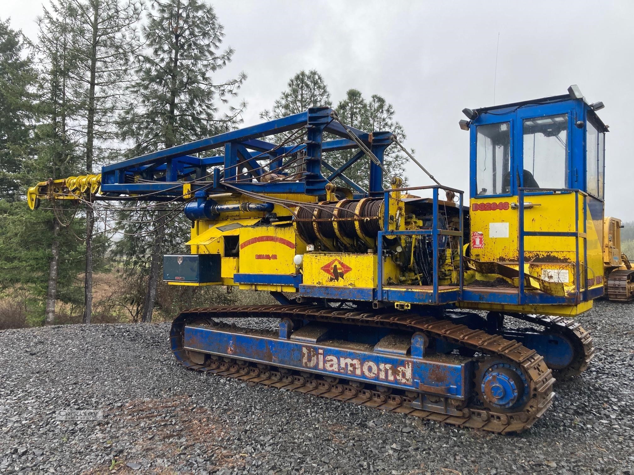 2008 Diamond DS2646 yarder parked outdoors with trees in the background.