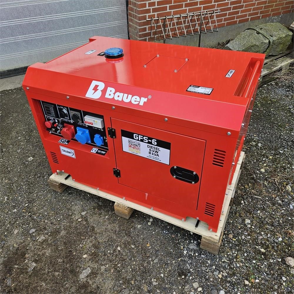 2026 Bauer GFS6 portable generator on a wooden pallet outside a building on a concrete surface.