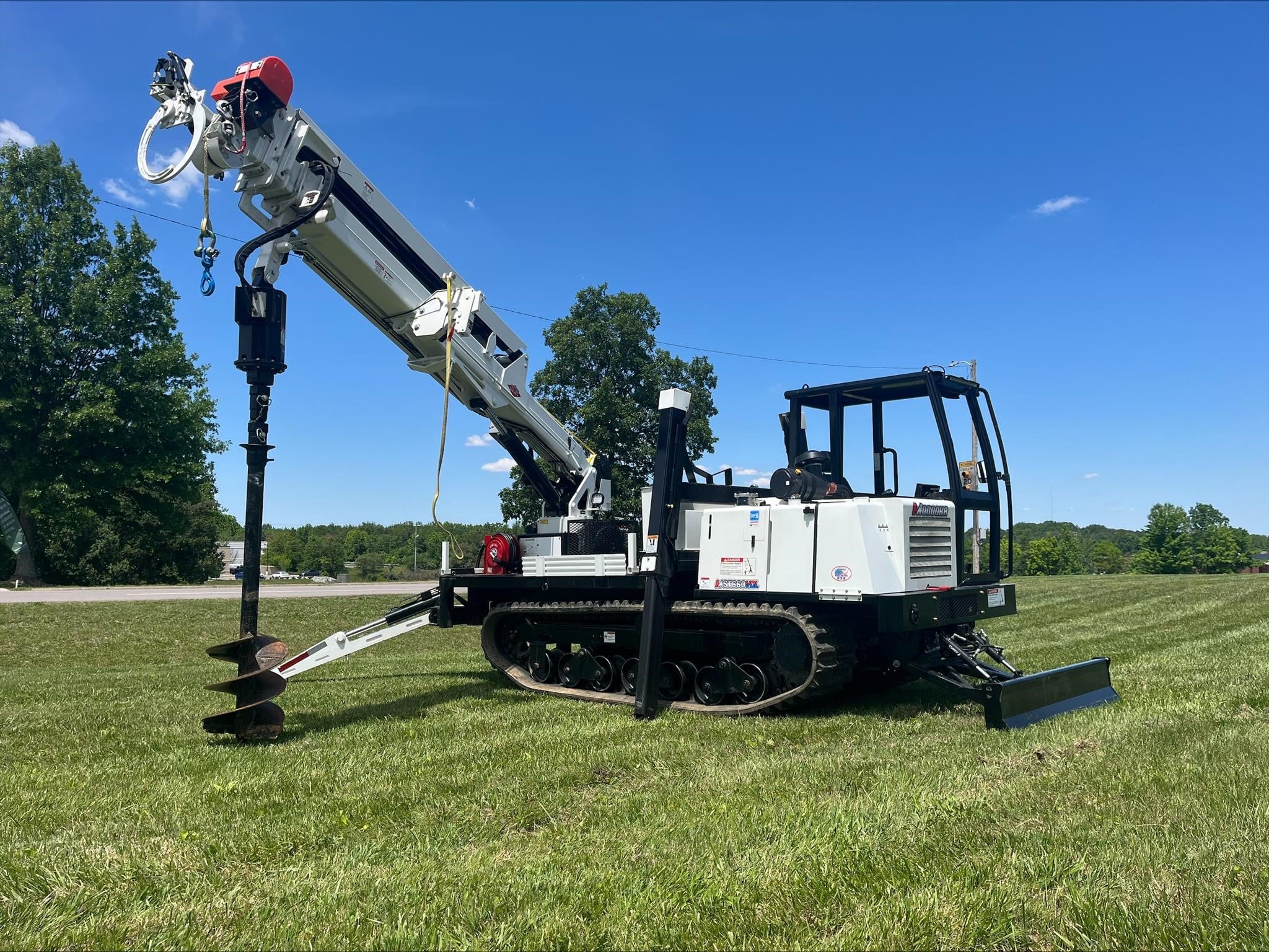 2025 SDP EZ Crauler 6000 track hole borer parked in a grass lot.