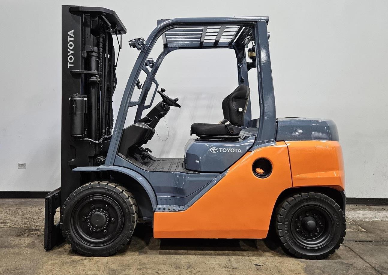 A 2021 Toyota 8FD35U pneumatic-tire forklift parked in a warehouse.