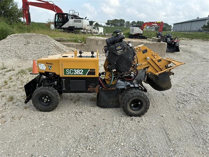 A 2023 Vermeer SC382 wheel stump grinder sits on a lot.