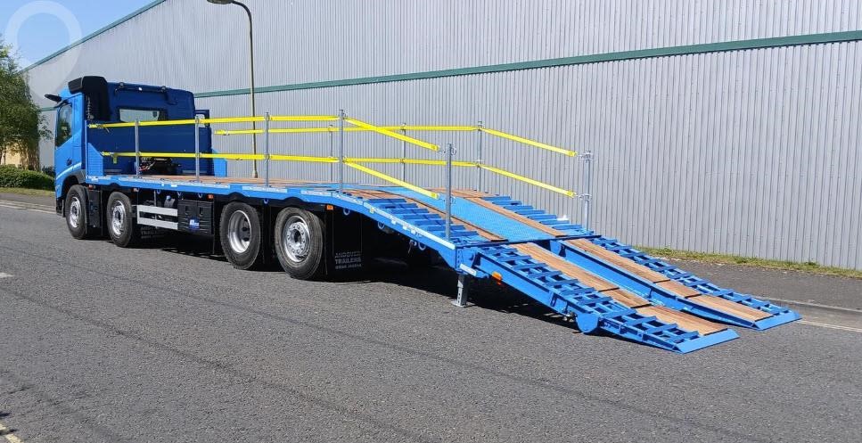 2025 Andover low loader trailer parked outdoors.