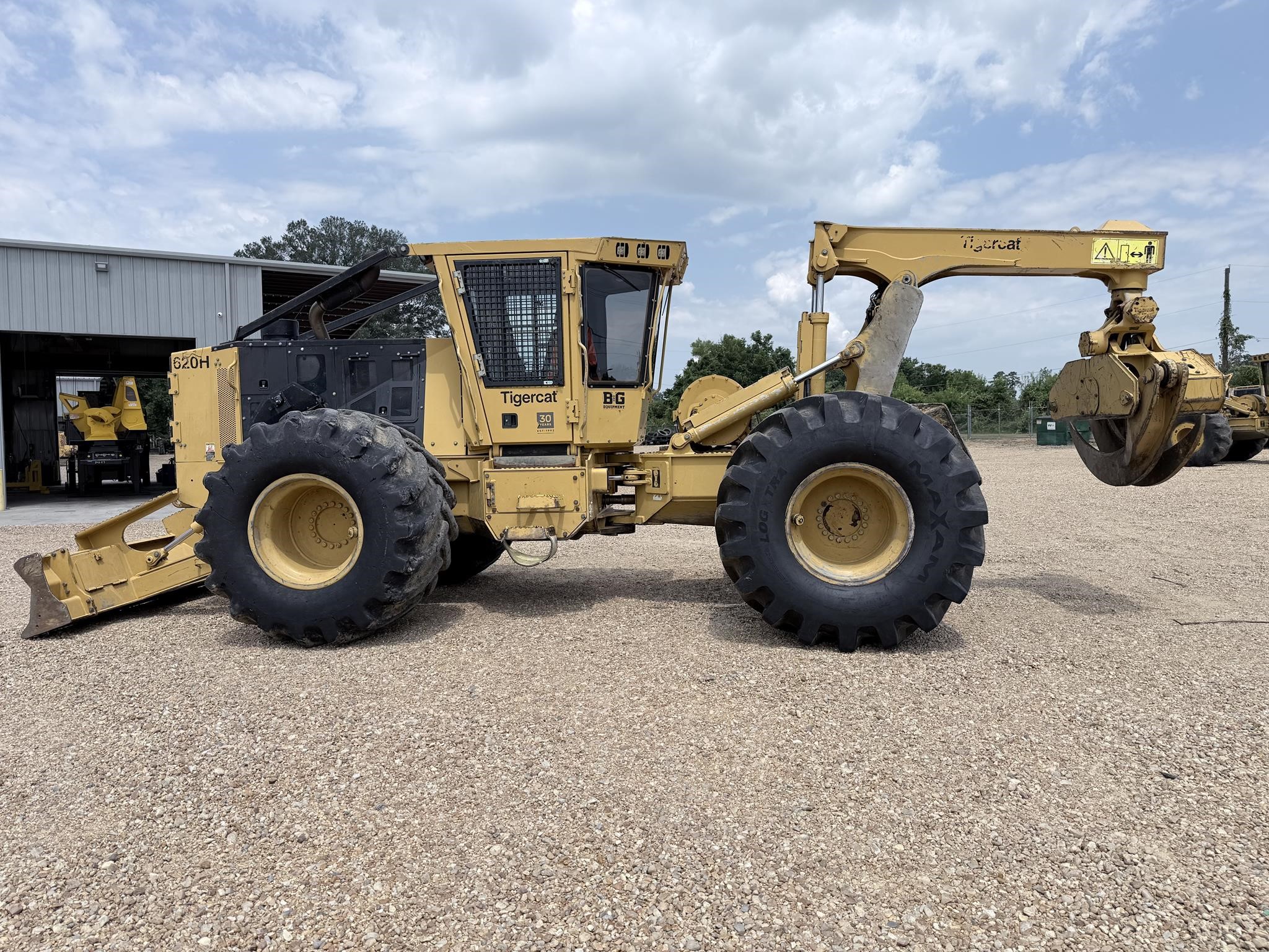 A 2022 Tigercat 620H skidders sits on a lot.