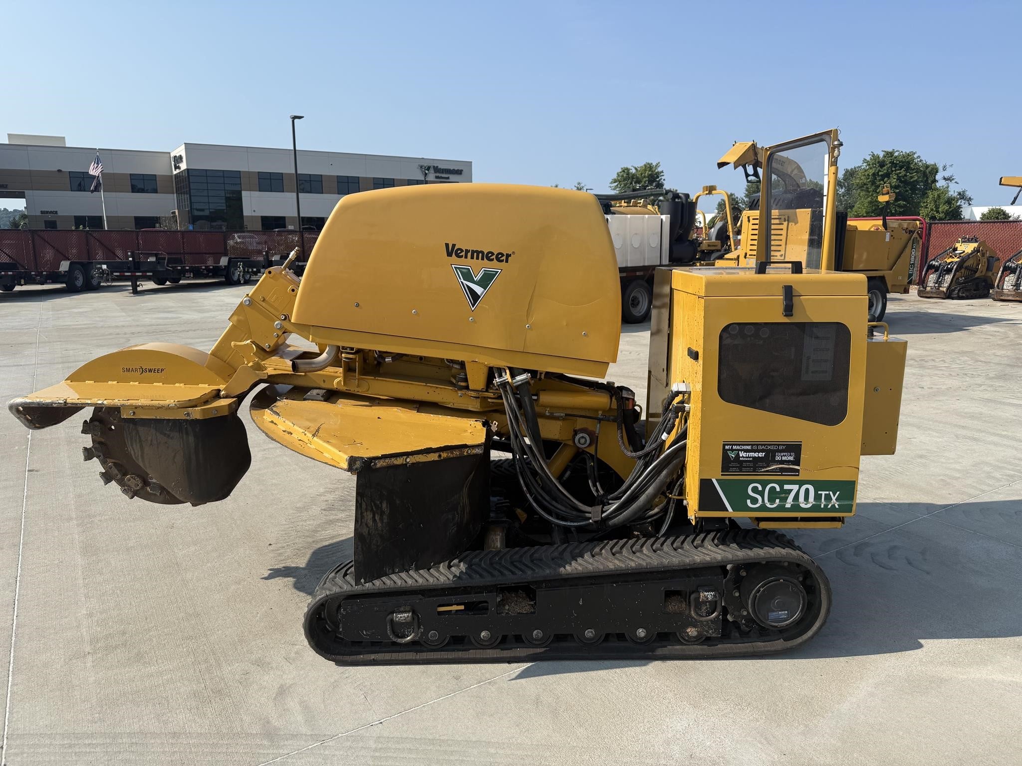 A 2021 Vermeer SC70TX track stump grinder sits on a lot.