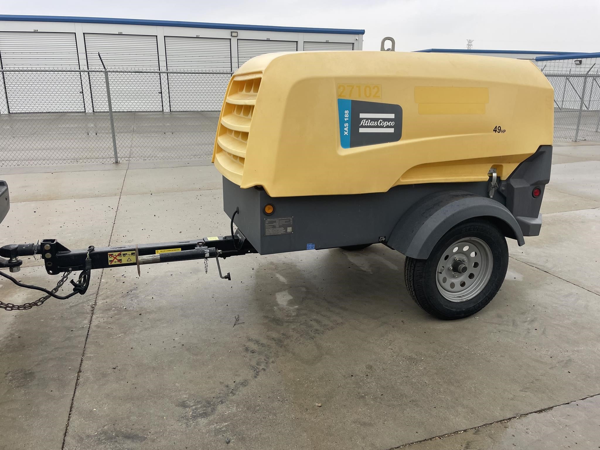 2023 Atlas Copco XAS188KD air compressor outdoors.