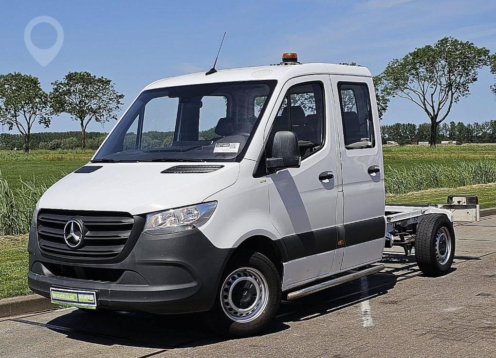 A 2023 Mercedes-Benz Sprinter 311 chassis cab van parked outdoors.