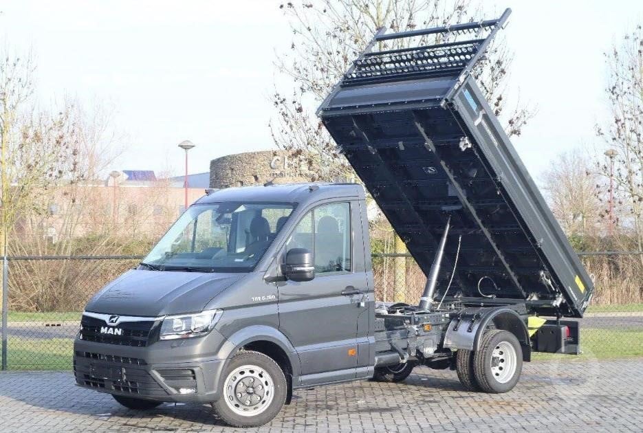 A 2025 MAN TGE 6.160 tipper van parked outdoors.