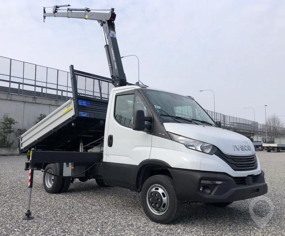 A 2026 Iveco Daily 35C16 tipper crane van parked outdoors.