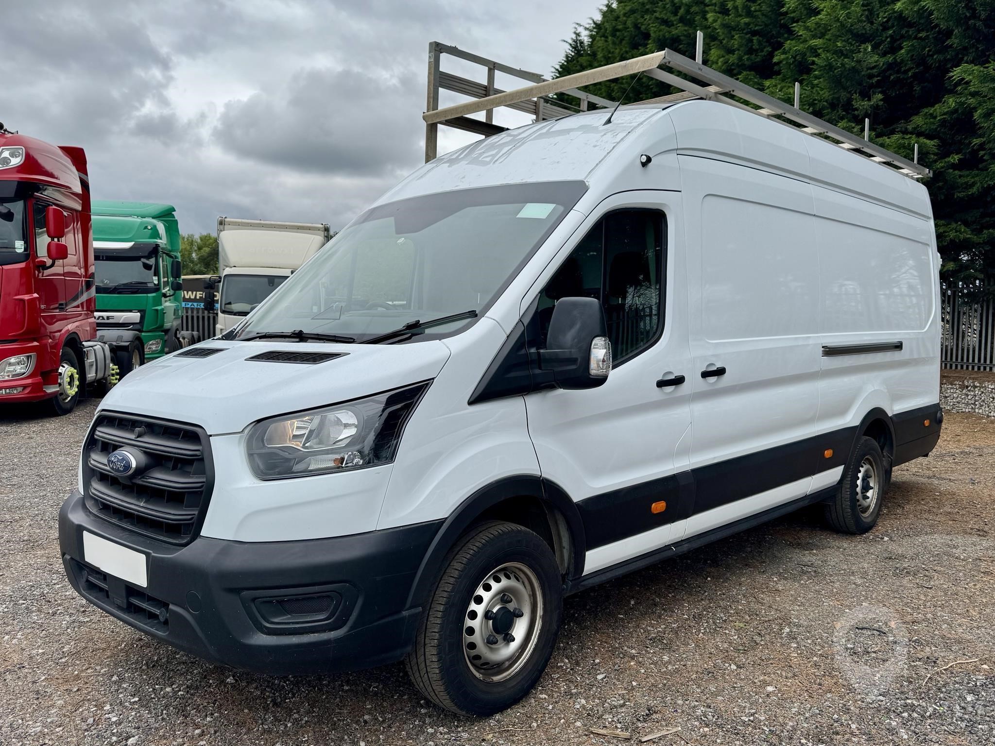 2021 Ford Transit glass carrier van parked outdoors.