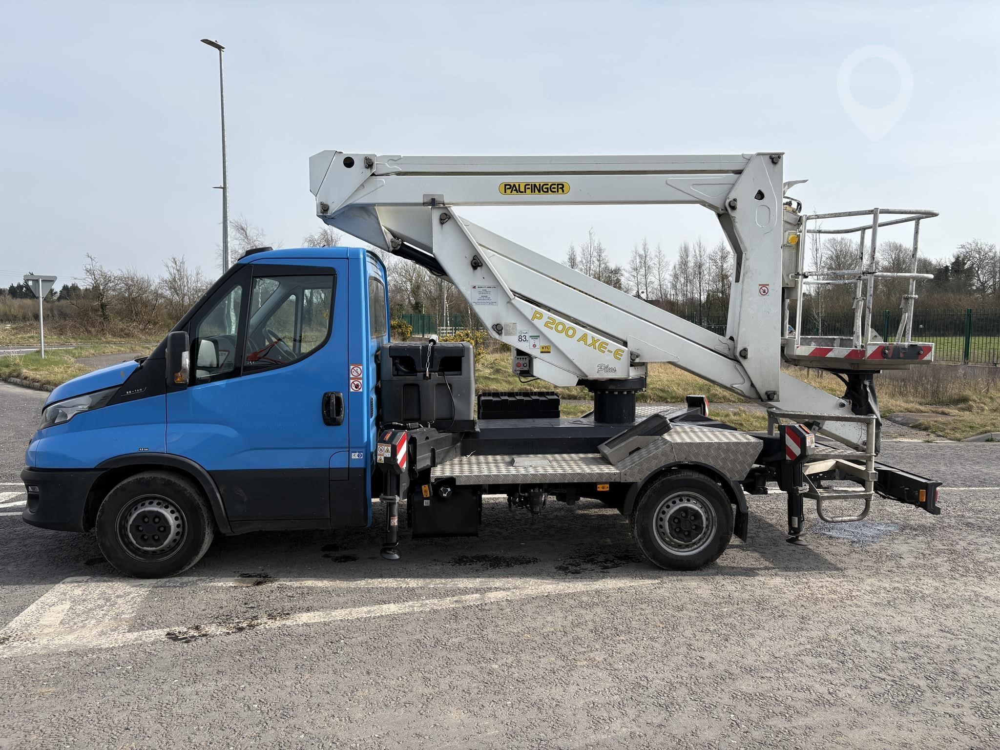 A 2024 Iveco Daily 35-140 cherry picker van sits on a lot.