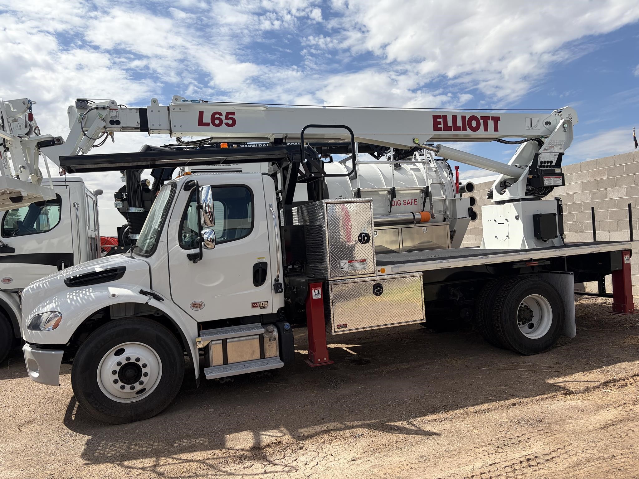 A 2025 Elliott L65R aerial platform lift truck sits on a lot.