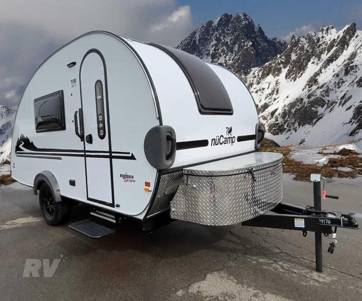 A 2026 NucampT@B 360 CS Boondock Black Canyon teardrop trailer parked outdoors.