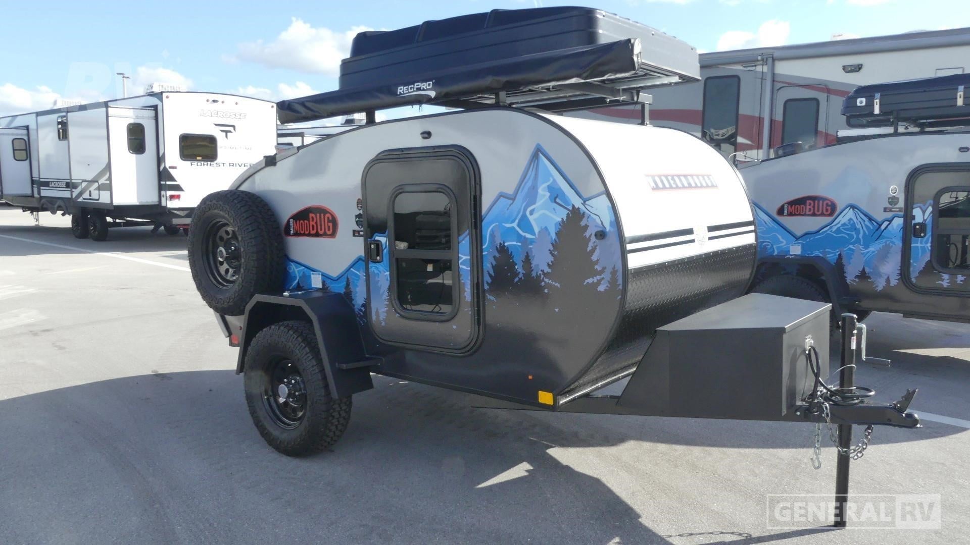 A 2026 Modern Buggy Little Buggy 10RK teardrop trailer parked outdoors.