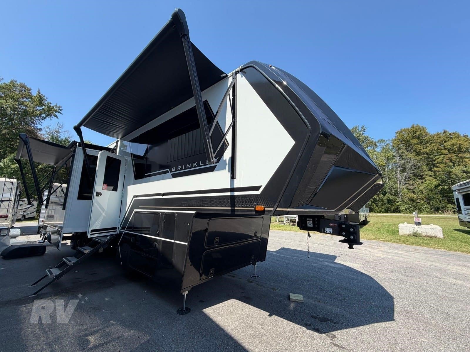 A 2026 Brinkley RV Model G 3970 fifth-wheel toy hauler parked in an outdoor lot.