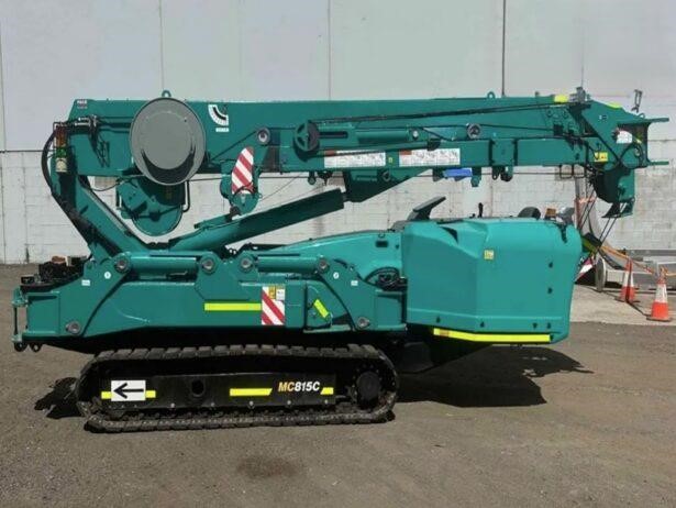A 2023 Maeda MC815C mini crane sits on a lot.