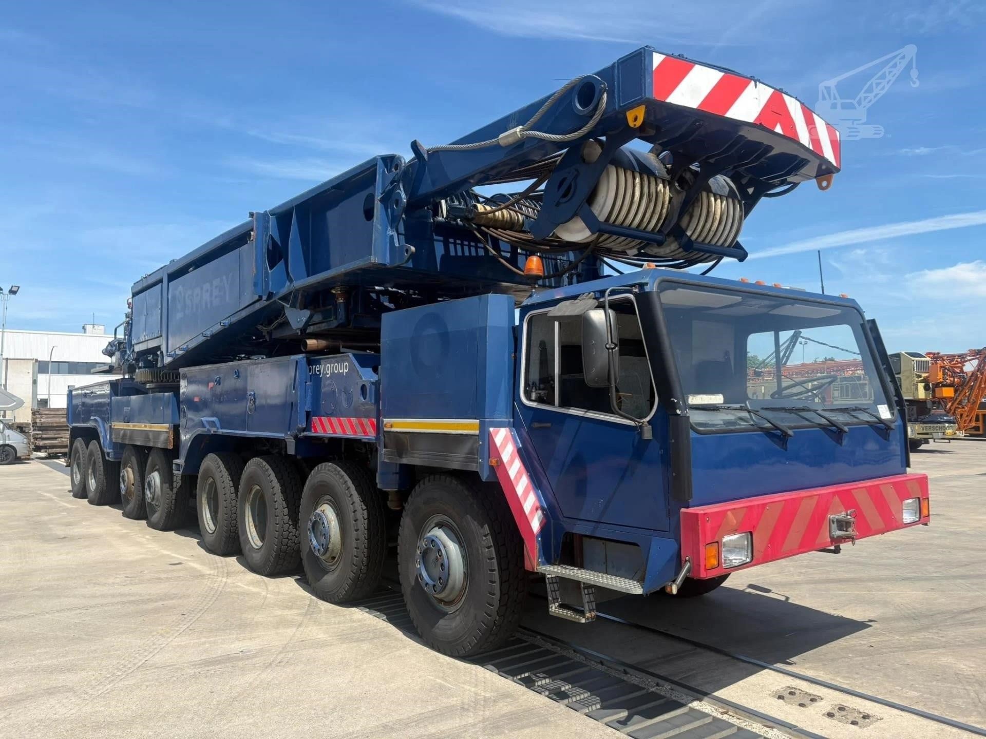 A 2000 Liebherr LG1550 lattice boom mobile crane sits on a lot.