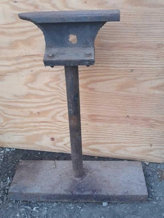 Homemade railroad iron anvil. 36" tall