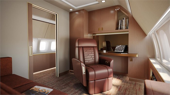 A private business office with desk and reclining seat available for the Boeing Business Jets 737-7 Max executive jet. 