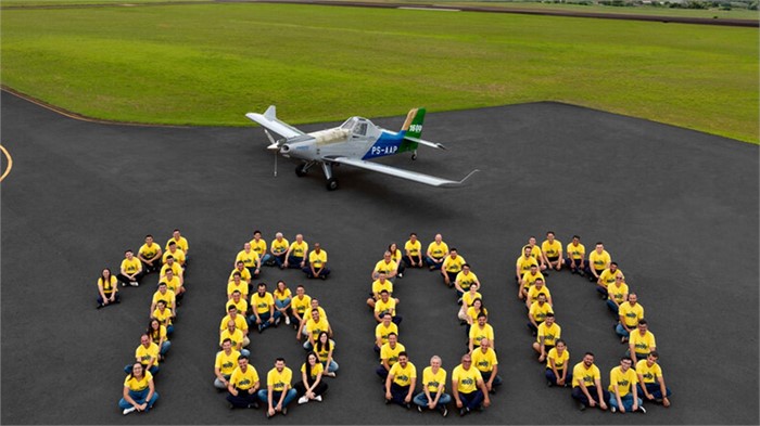 Employees at Embraer’s factory in Botucatu, Brazil, celebrate the 1,600th delivery of an Embraer Ipanema.