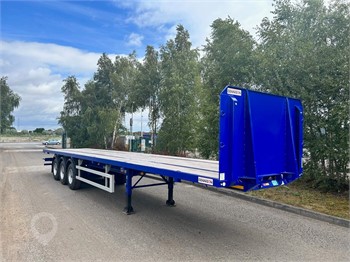2024 DENNISON NEW 2024 FLATBEDS WITH POSTS AND SOCKETS Used Standard Flatbed Trailers for sale