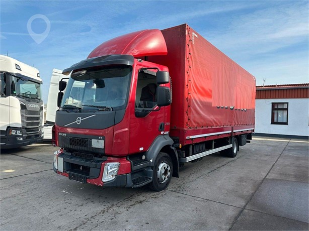 2014 VOLVO FL210 Used Curtain Side Trucks for sale
